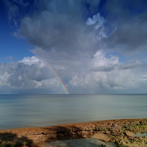 Image by wostemme titled ’pacific, rainbow, ocean’. Source: Pixabay