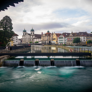 Image by timulrich_pix titled ’waterfall, cityscape, switzerland’. Source: Pixabay