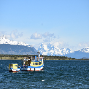 Image by ii7017 titled ’patagonia, puerto natales, boats’. Source: Pixabay
