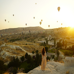 Image by alexman89 titled ’hot air balloons, valley, girl’. Source: Pixabay