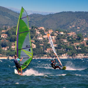 Image by Joenomias titled ’windsurfing, windsurfers, aquatics’. Source: Pixabay